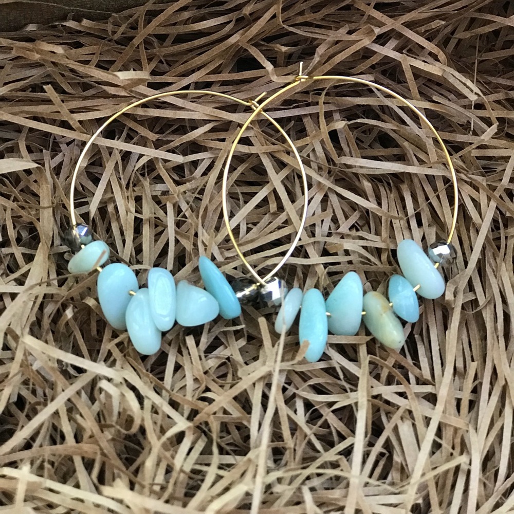 Gold hoop earrings with blue beads